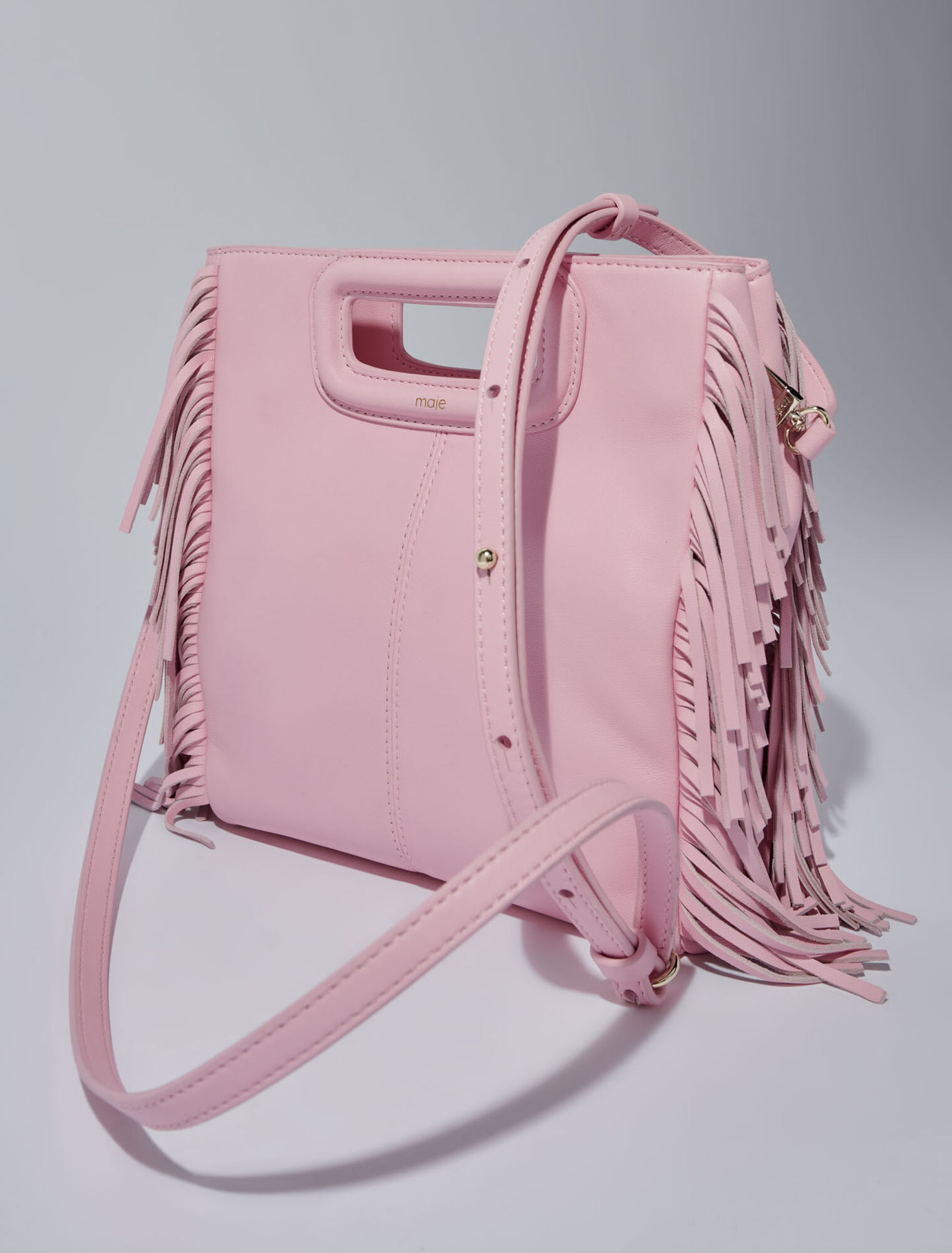 Bolso M con flecos de piel lisa