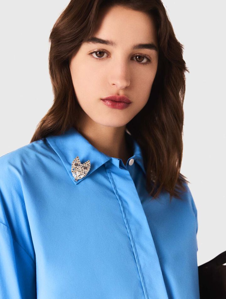 Camisa con joya desmontable