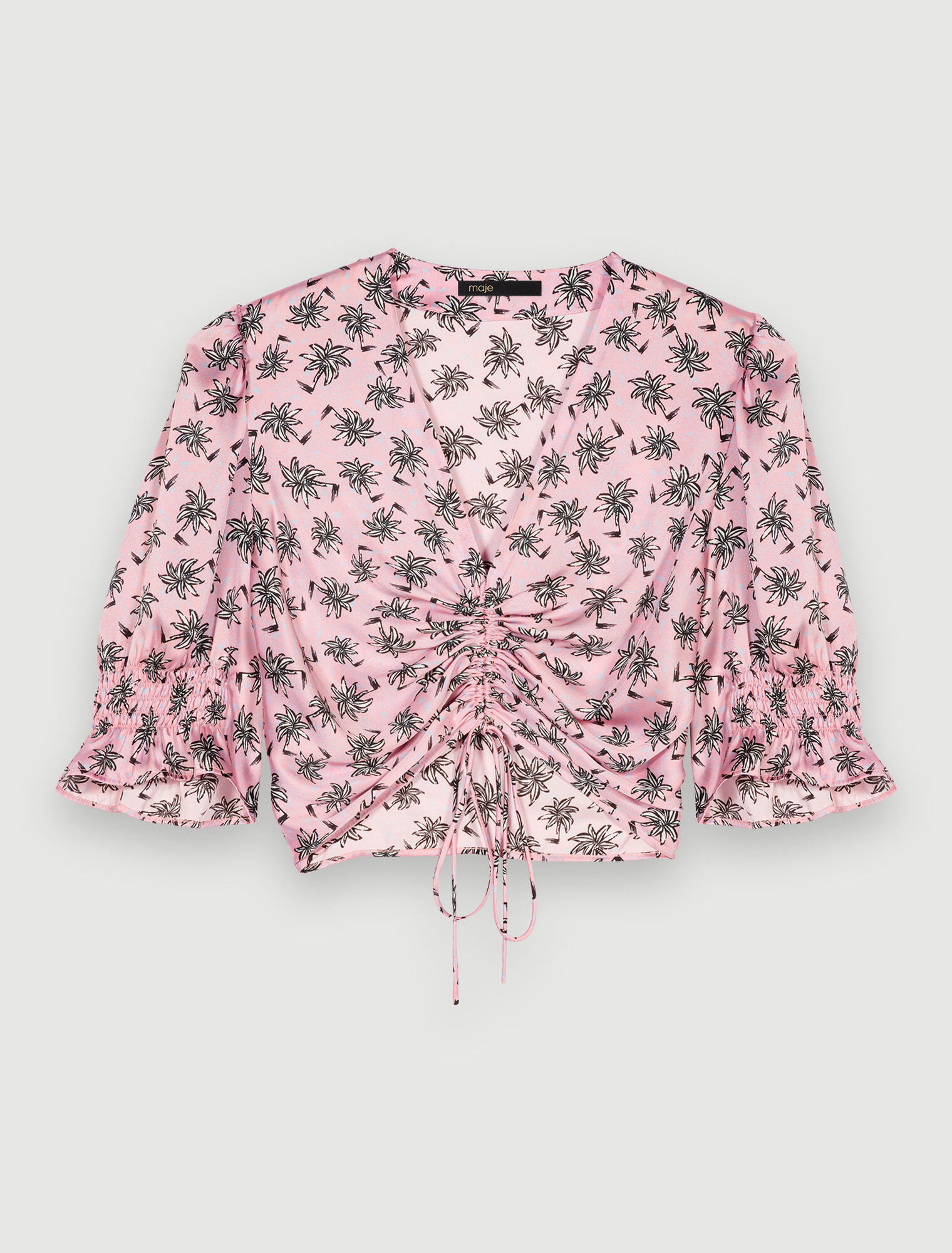 Top estampado de palmeras