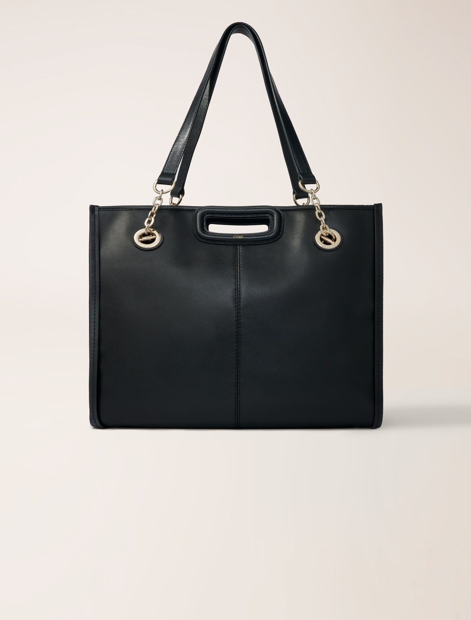 Bolso cabás de cuero con flecos
