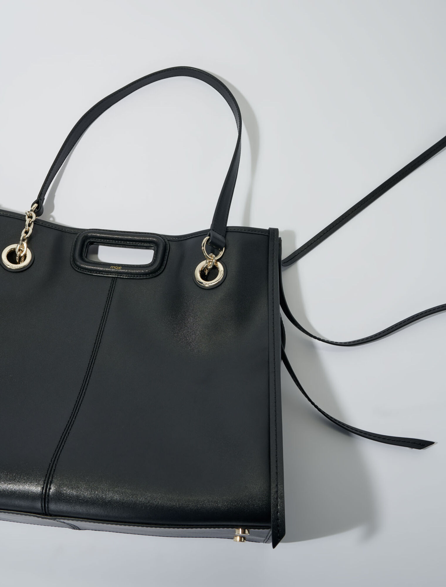 Bolso cabás de cuero con flecos