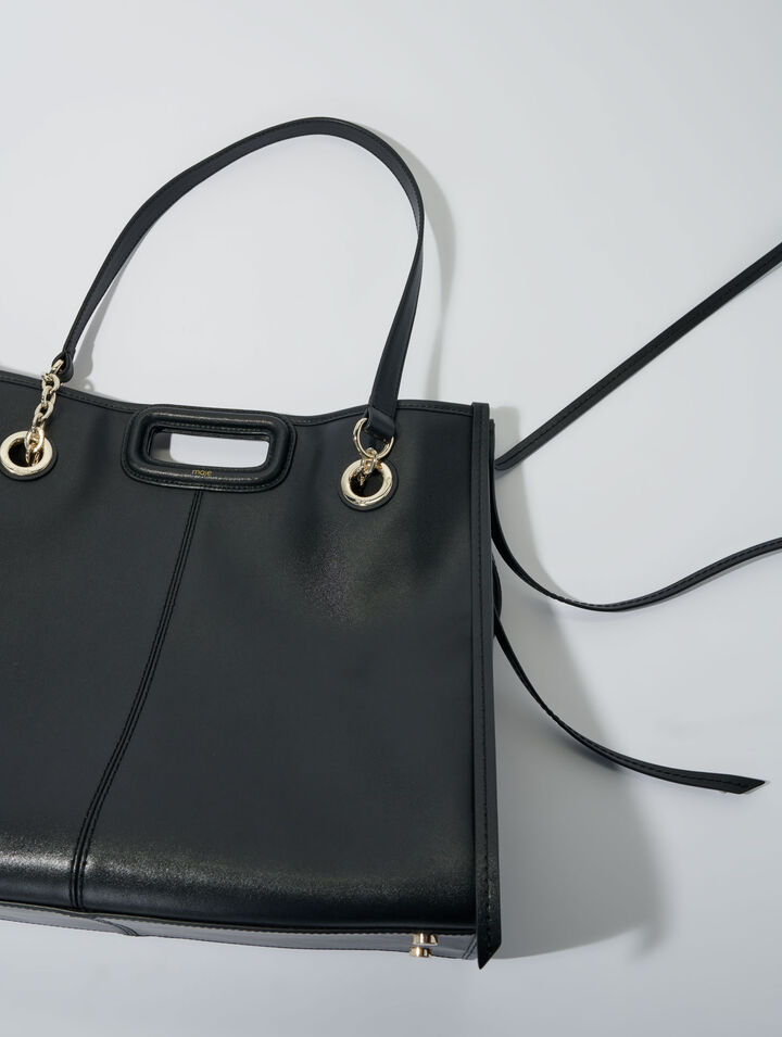Bolso cabás de cuero con flecos