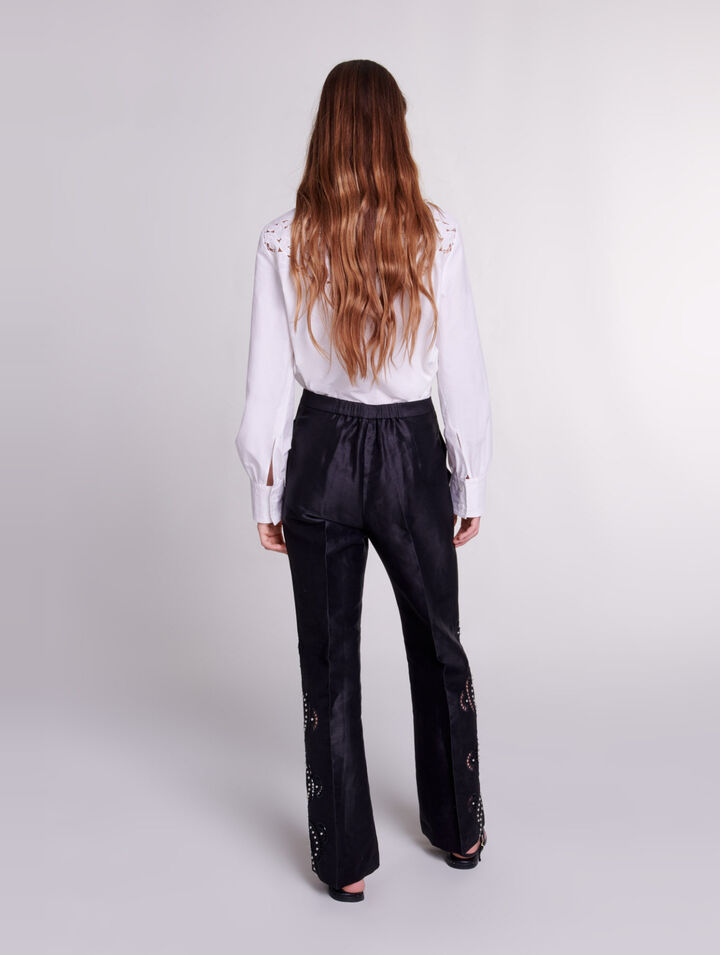 Pantalón acampanado calado