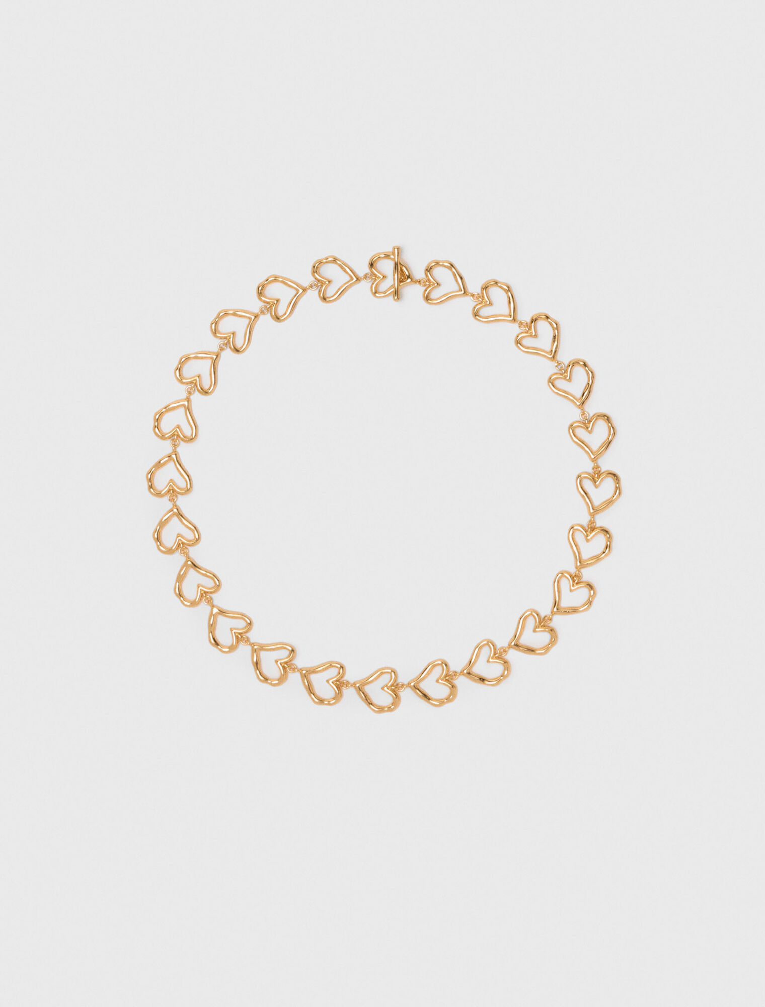 Collar corazón de latón dorado