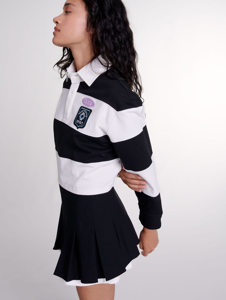 Falda short plisada de dos materiales