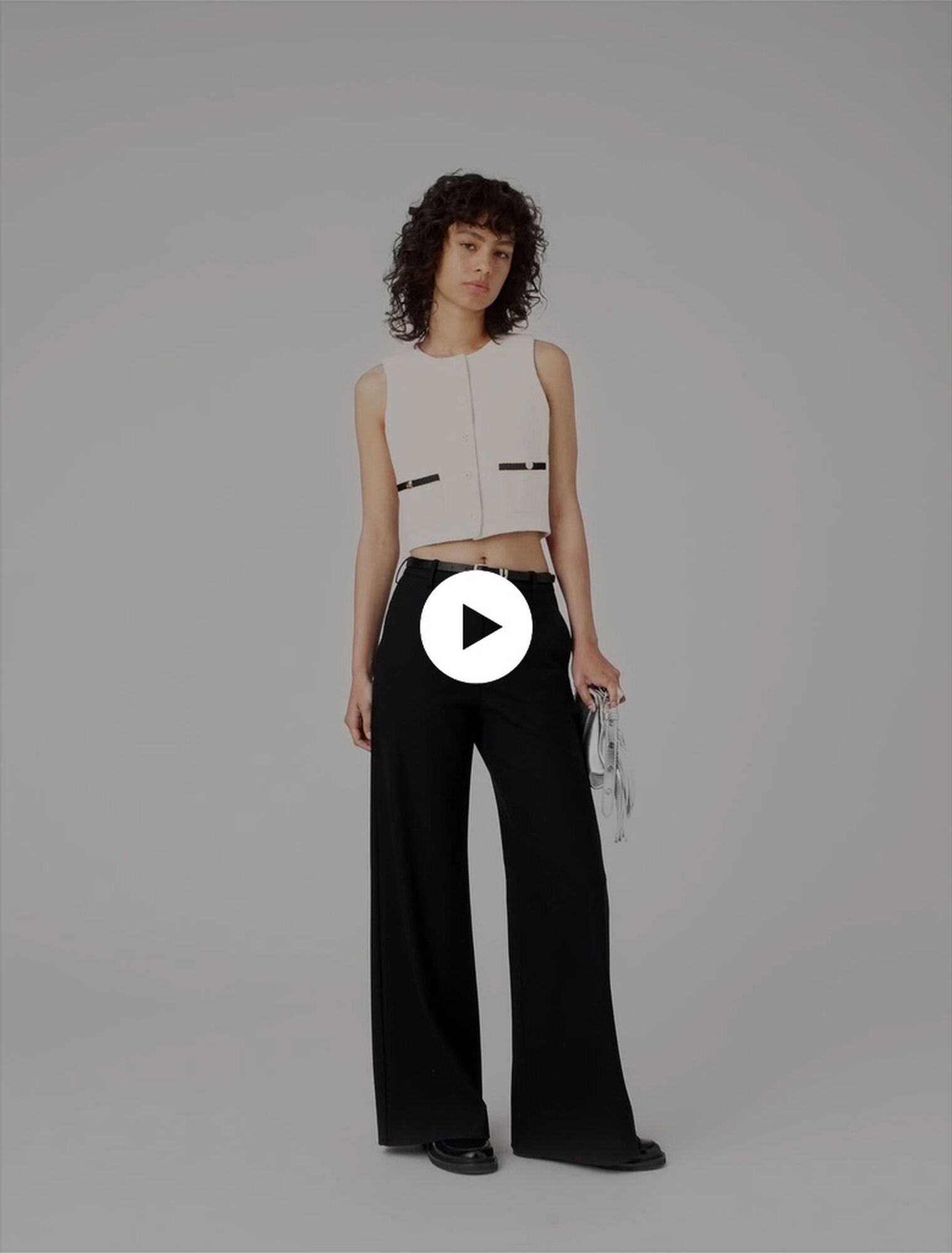 Top sin mangas de tweed lurex