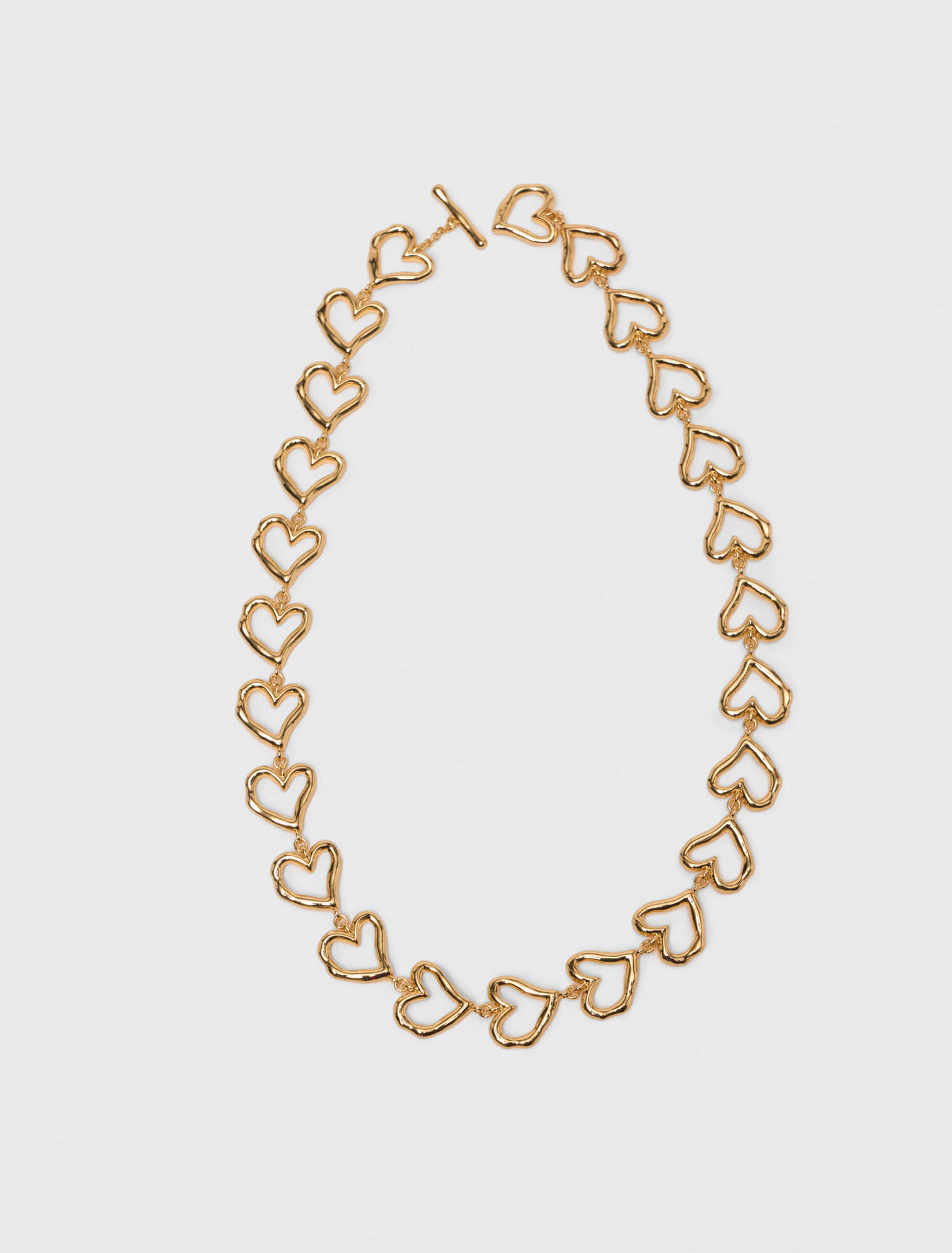Collar corazón de latón dorado