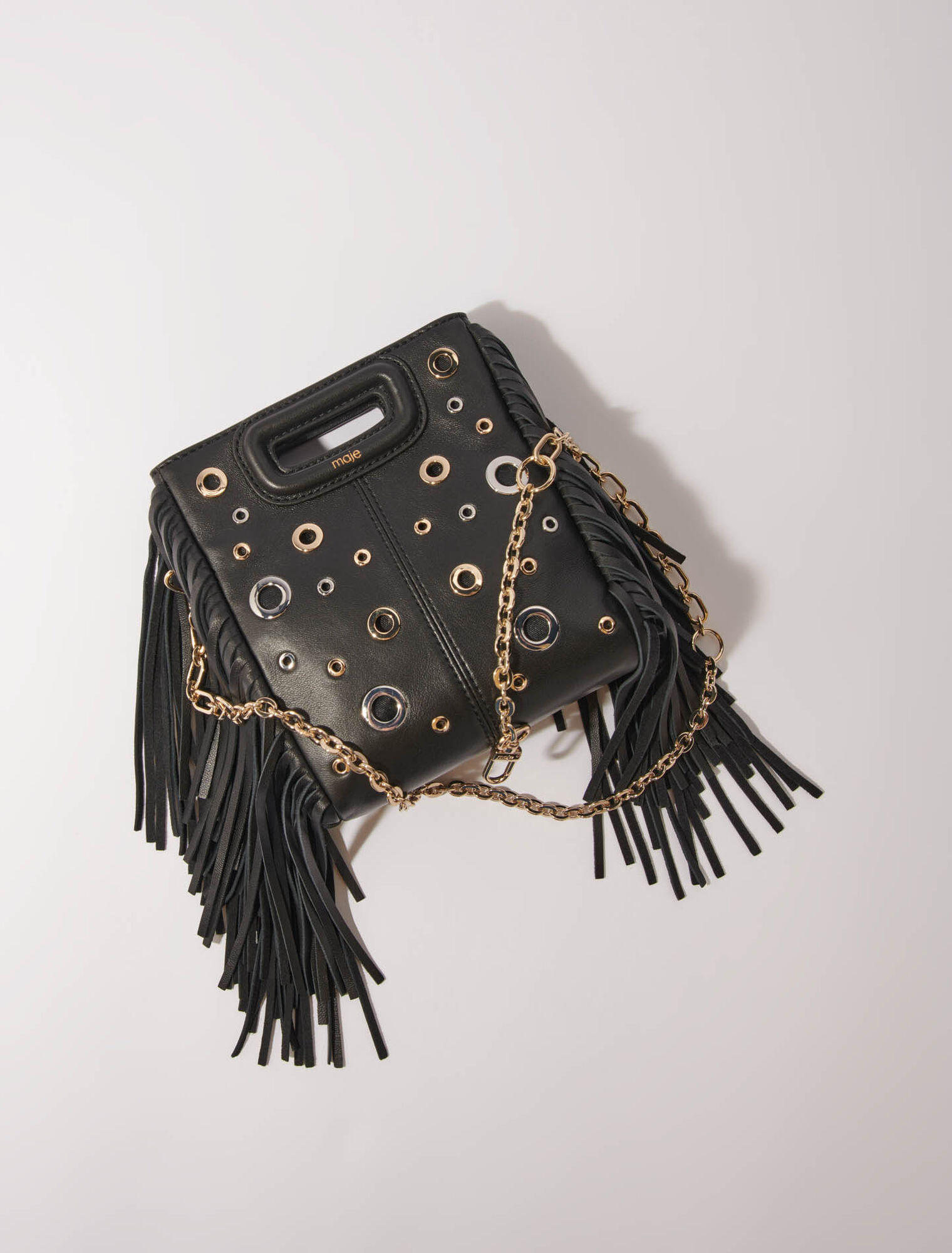 Bolso M mini de cuero con ojales