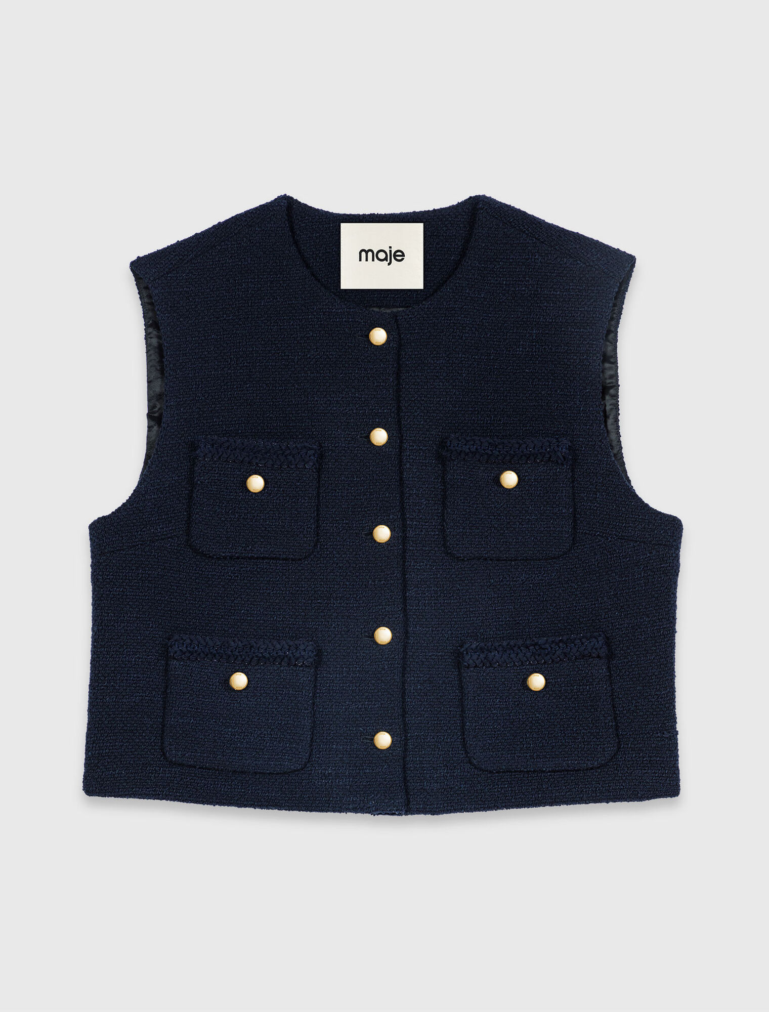 Chaqueta de tweed sin mangas