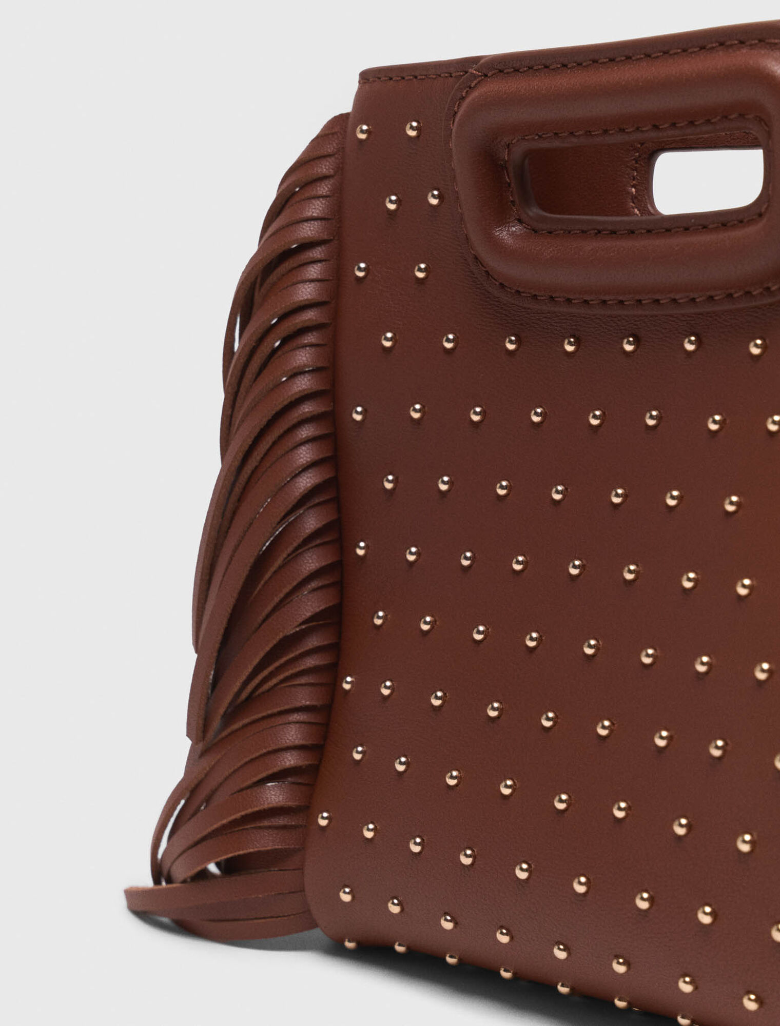 Bolso M mini de cuero y tachuelas