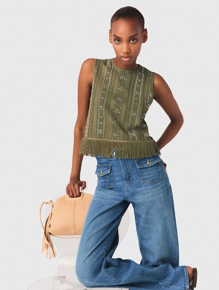 Top con flores de strass y flecos