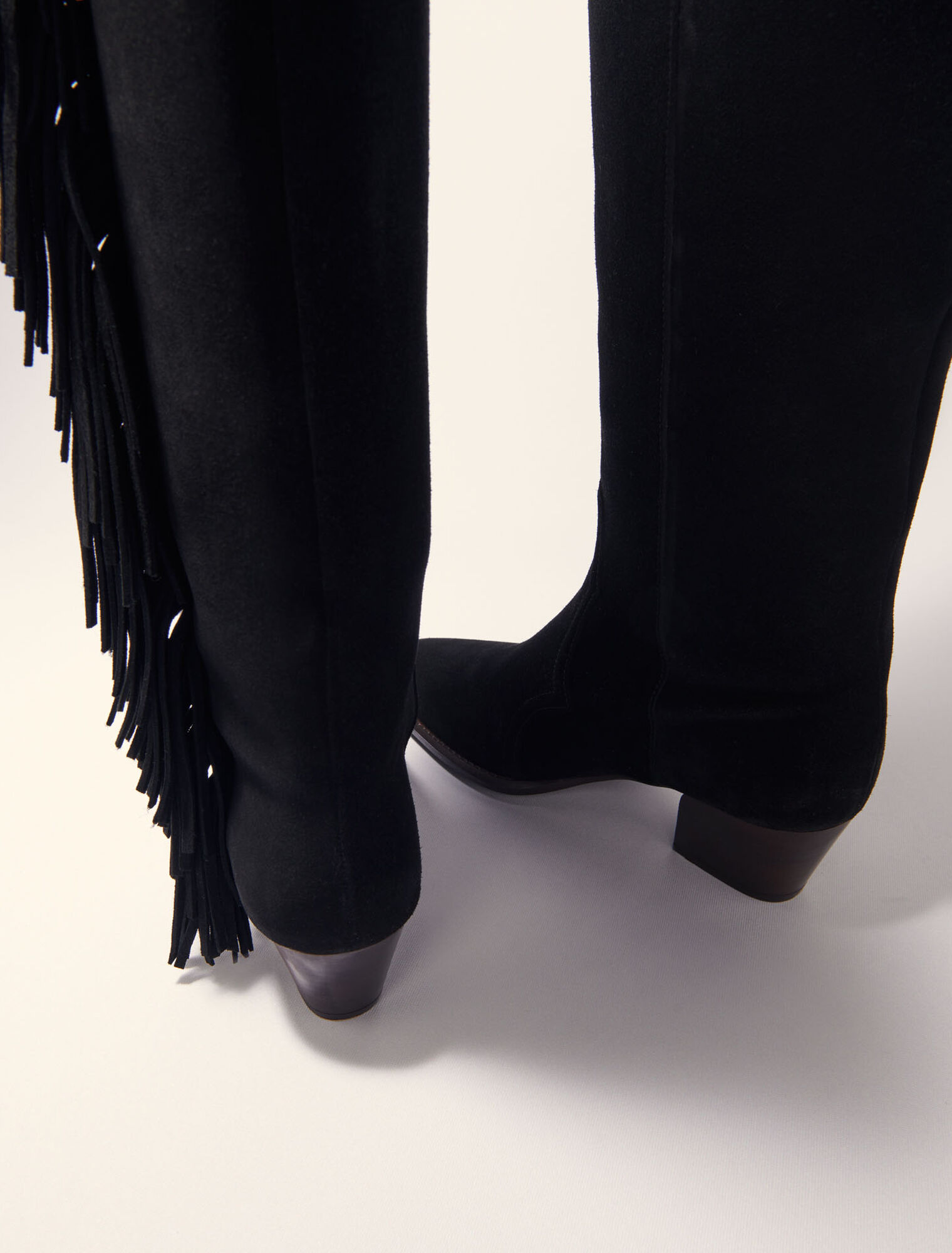 Botas de vaquero de ante con flecos