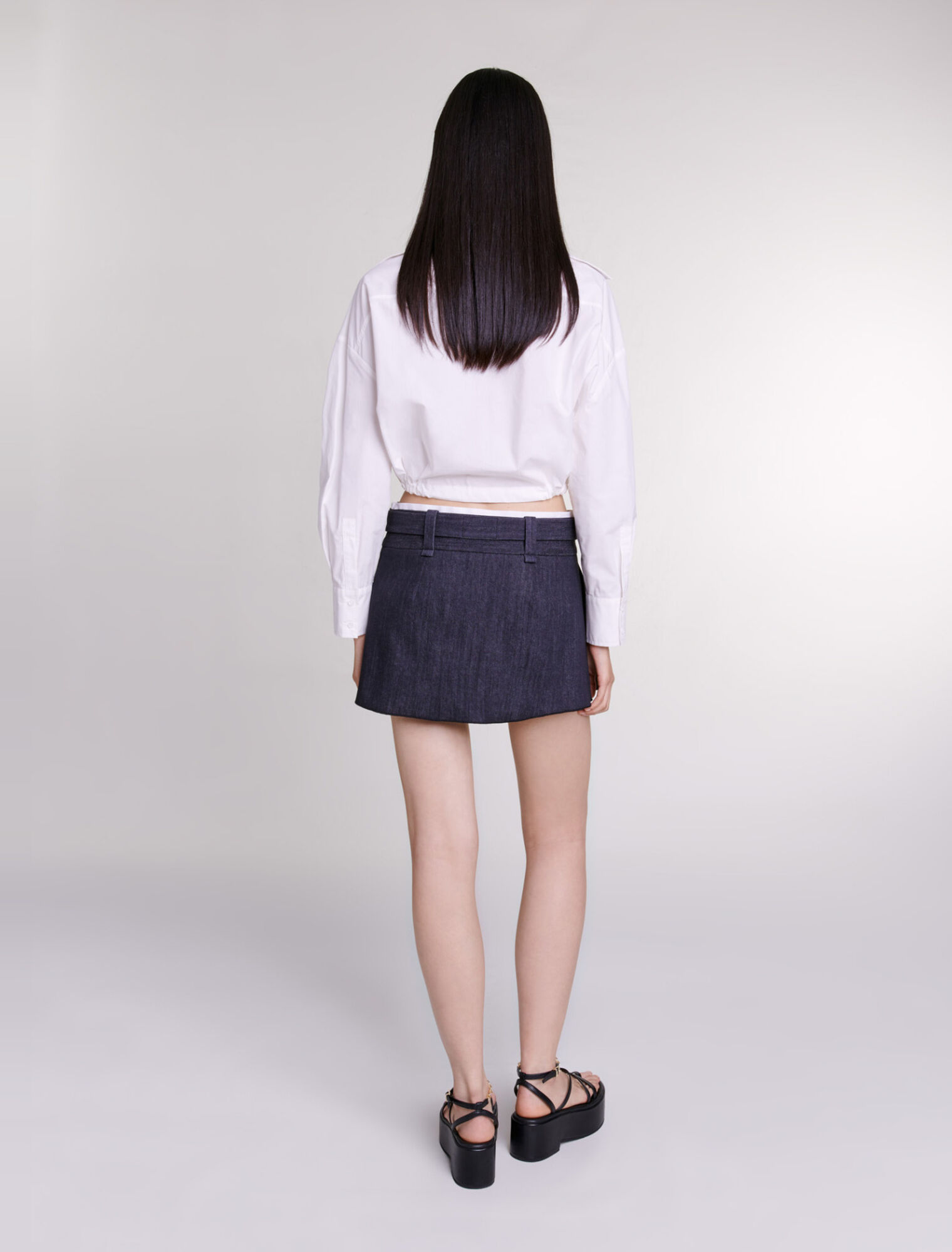 Minifalda negra efecto denim