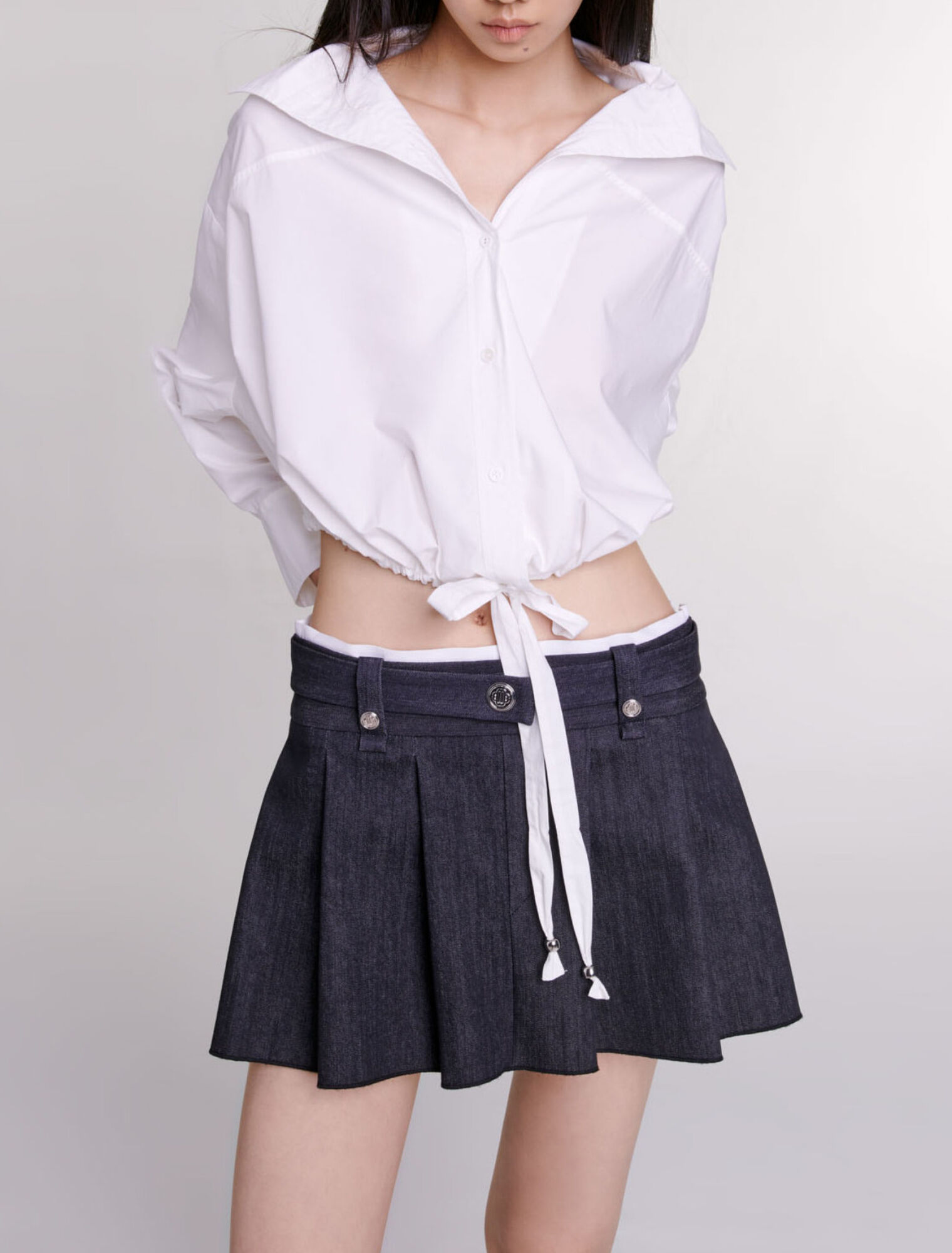 Minifalda negra efecto denim