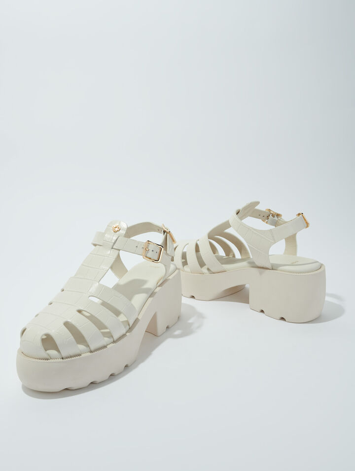 Sandalias de suela dentada en piel