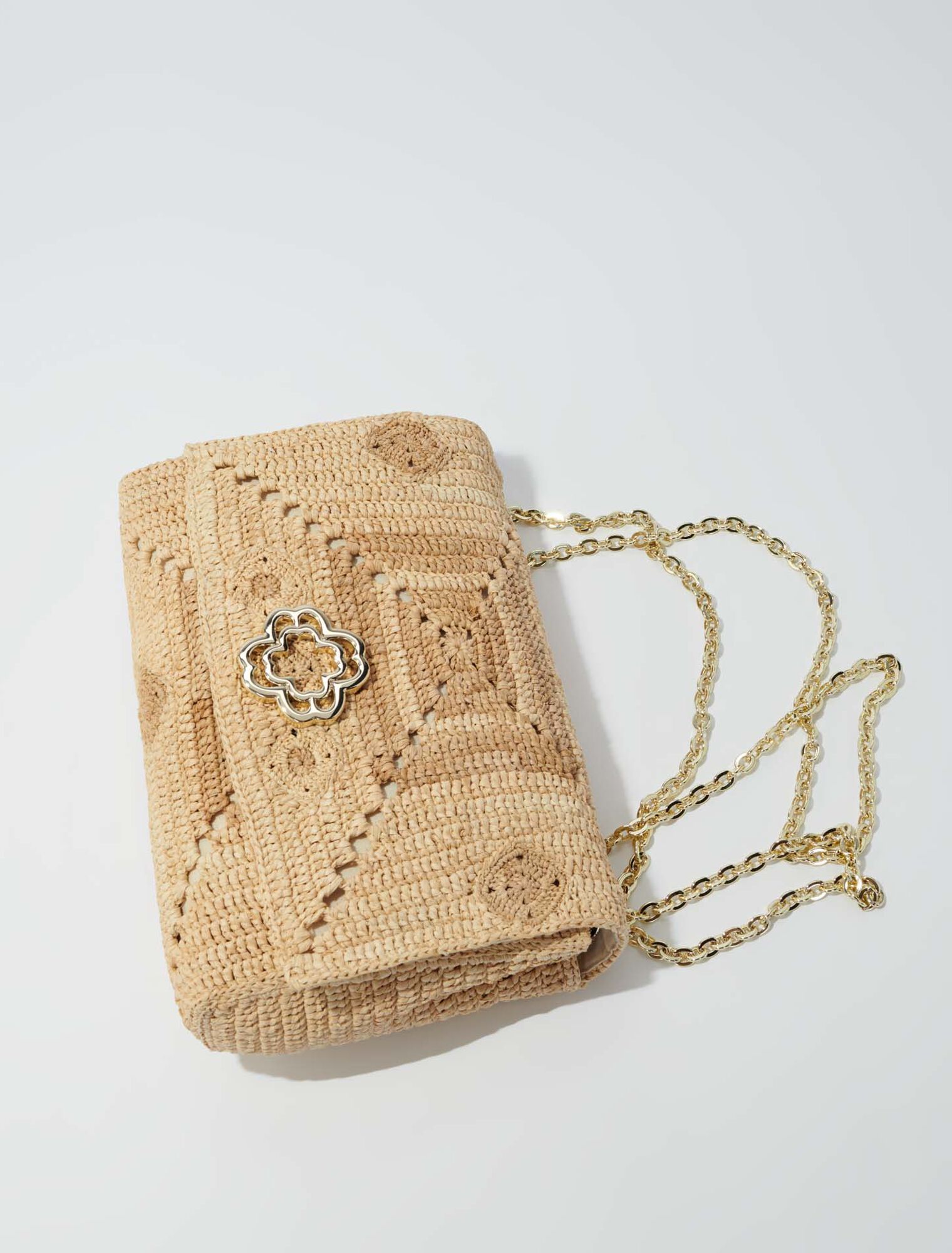 Bolso clover de rafia hecho a mano