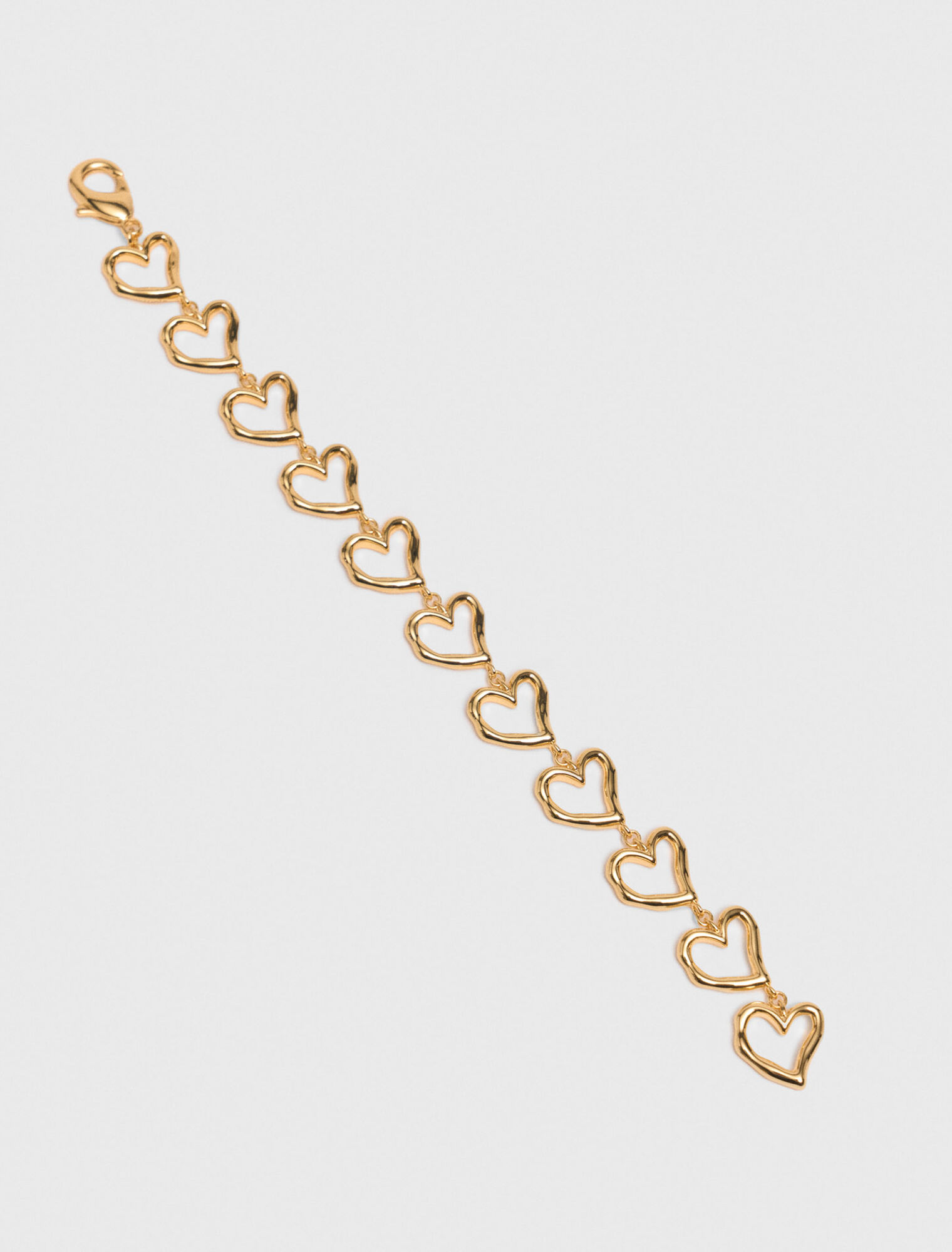 Pulsera corazón de latón dorado