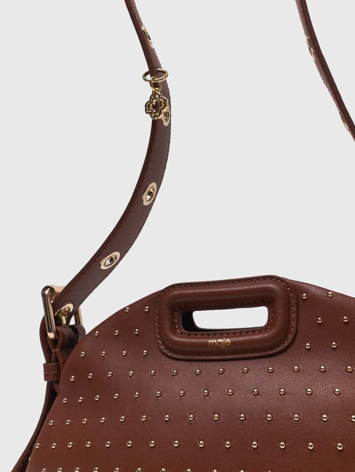 Bolso Miss M mini de cuero y tachas