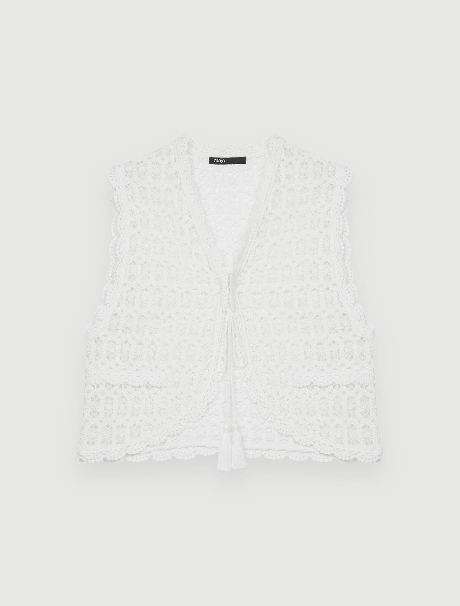 Chaqueta pequeña sin mangas de guipur