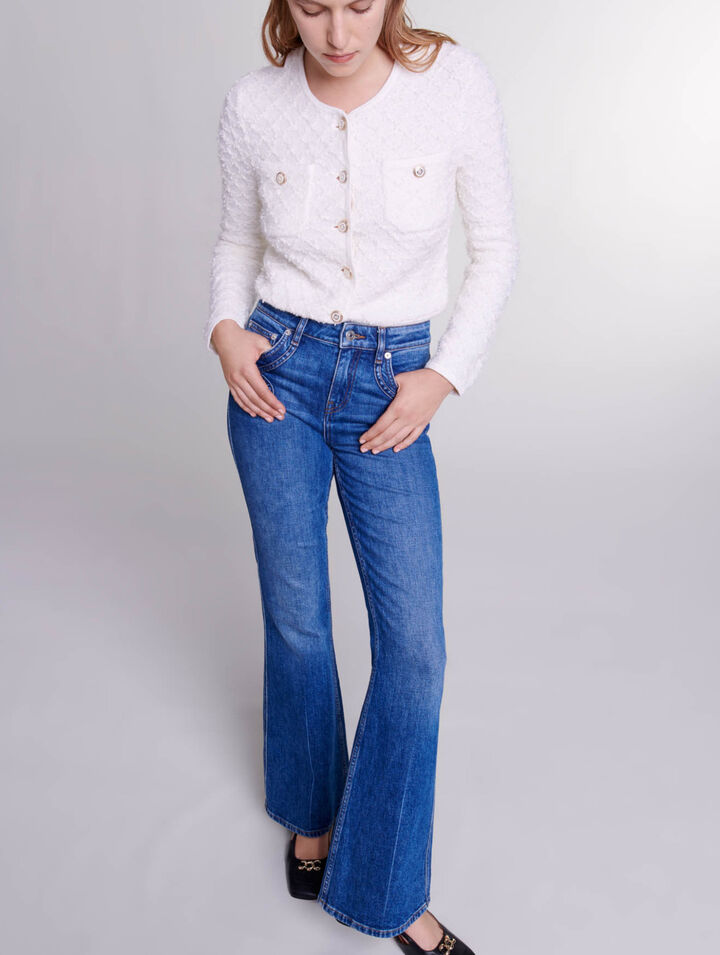 Vaqueros flare con bolsillos bordados