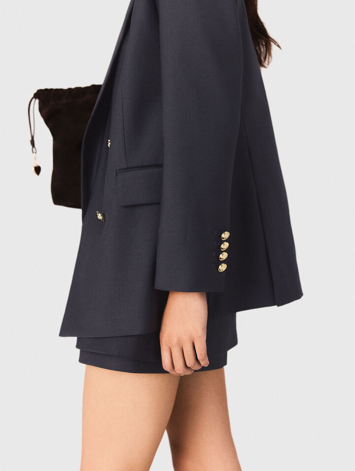 Chaqueta sastre con botones dorados
