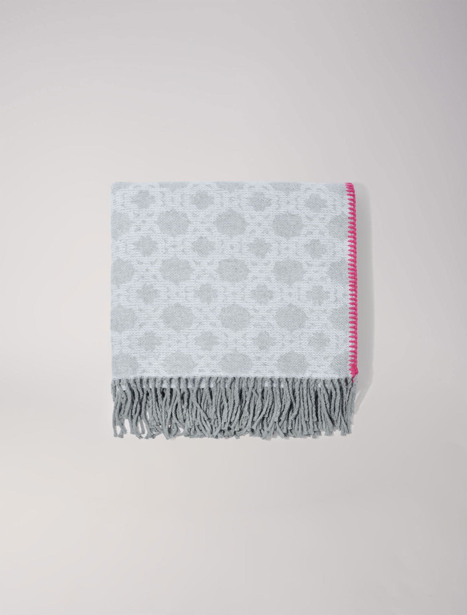Poncho con monograma
