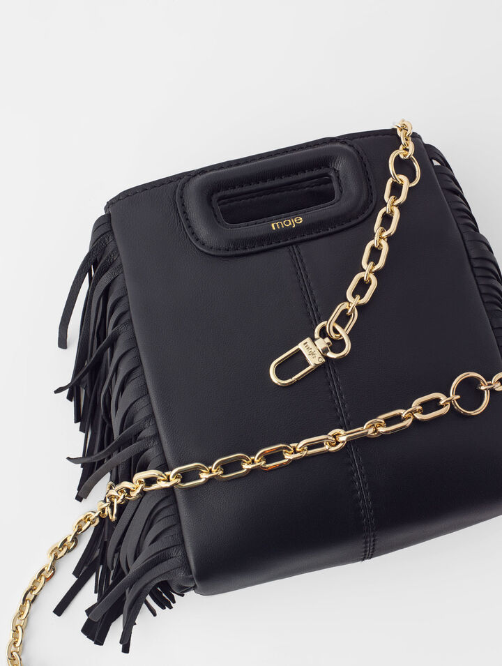 Bolso de piel con cadena