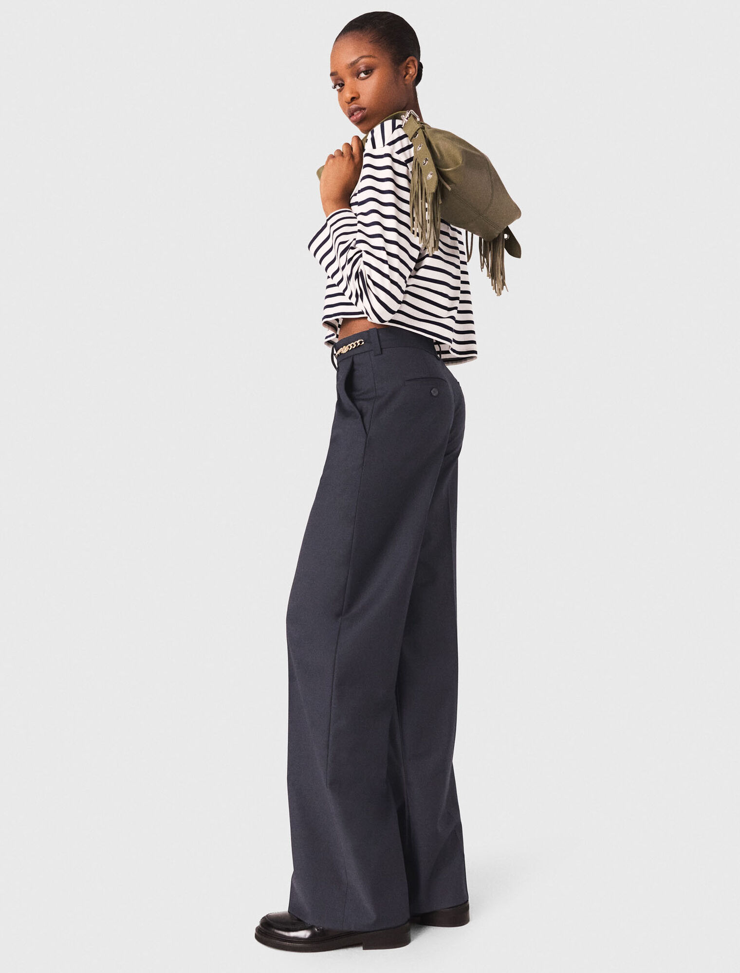 Pantalón sastre con detalles cadena