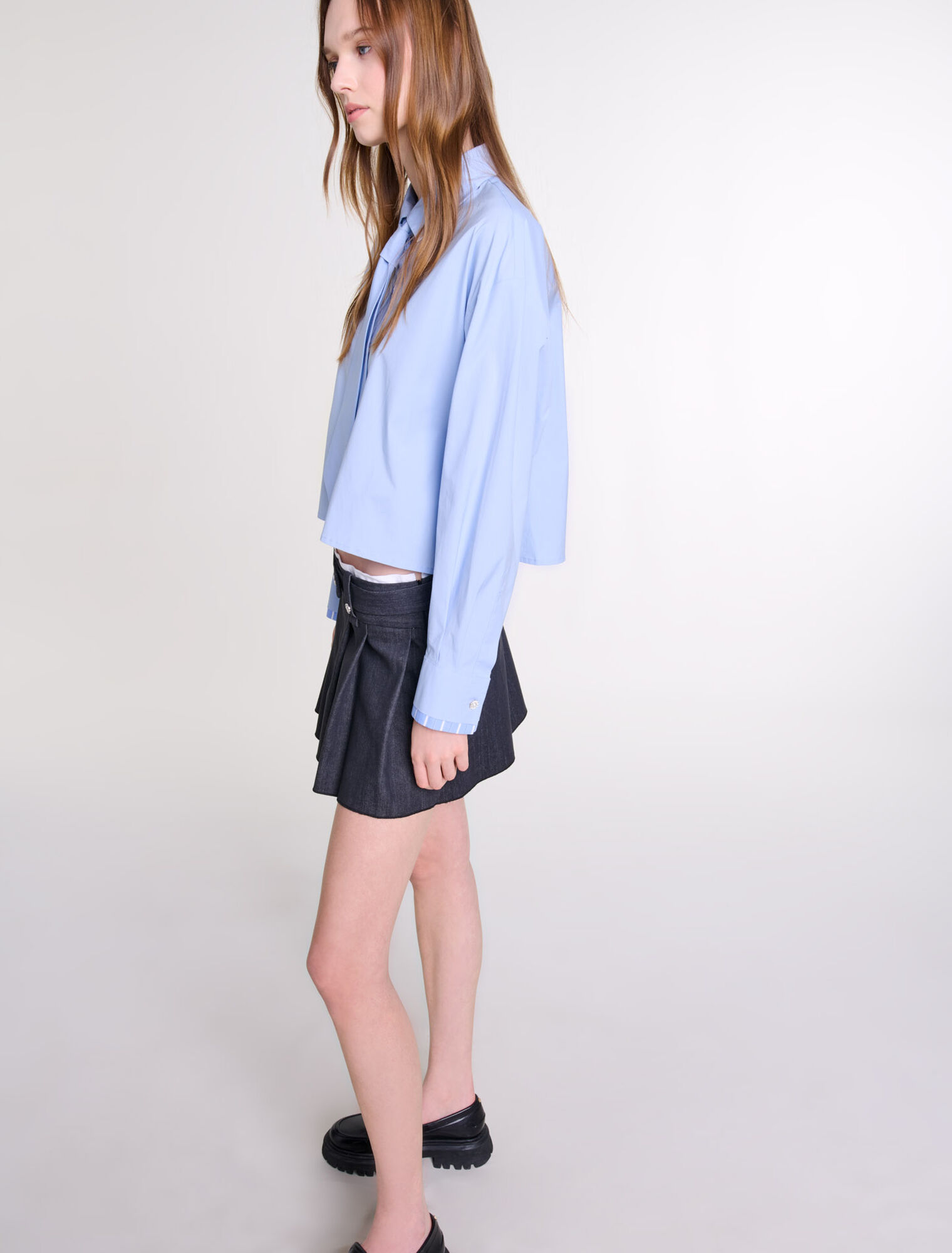Minifalda negra efecto denim