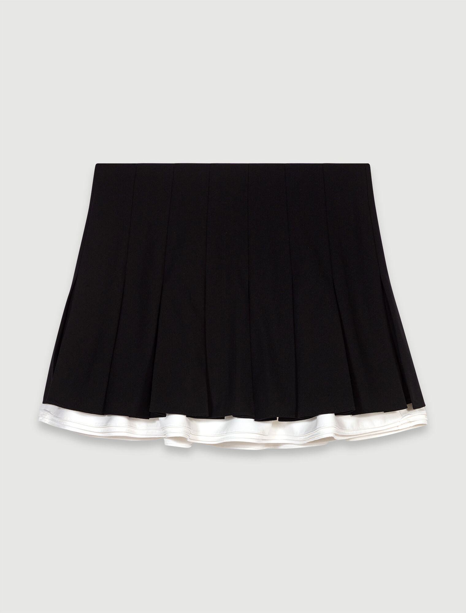 Falda short plisada de dos materiales