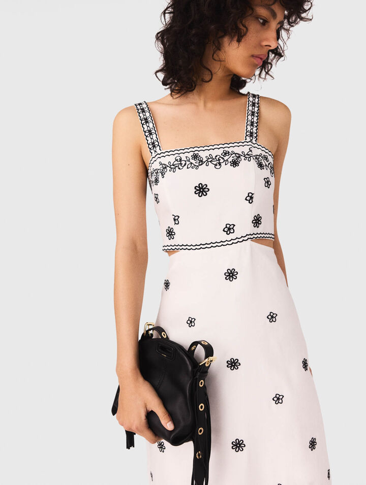 Vestido largo bordado con recortes