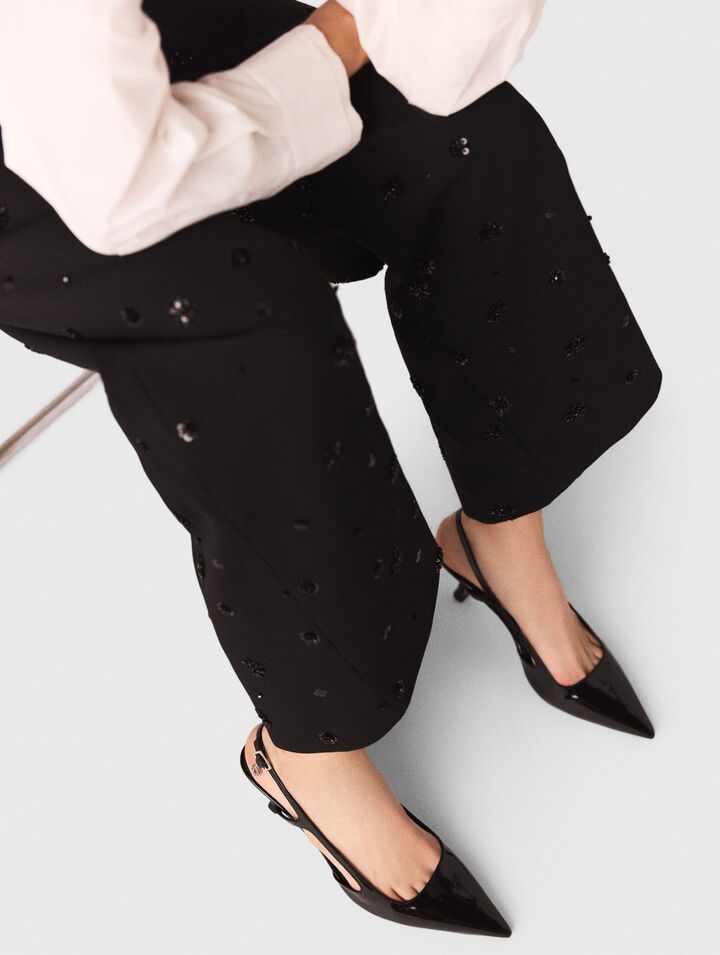 Pantalón con tirantes bordado
