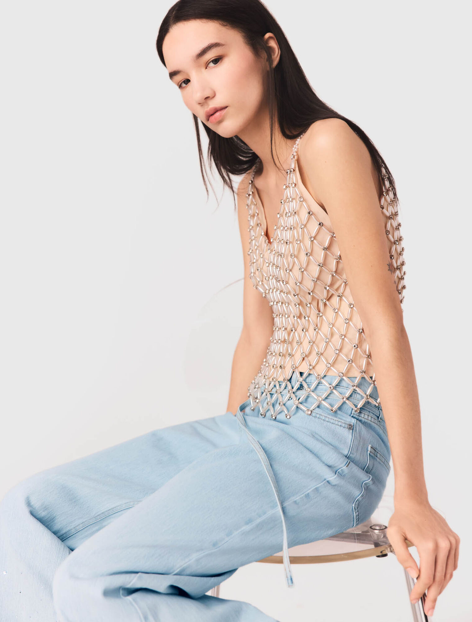 Top de perlas con forro