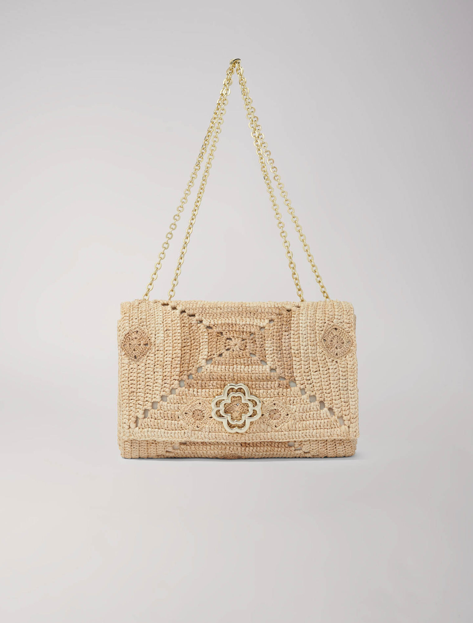Bolso clover de rafia hecho a mano