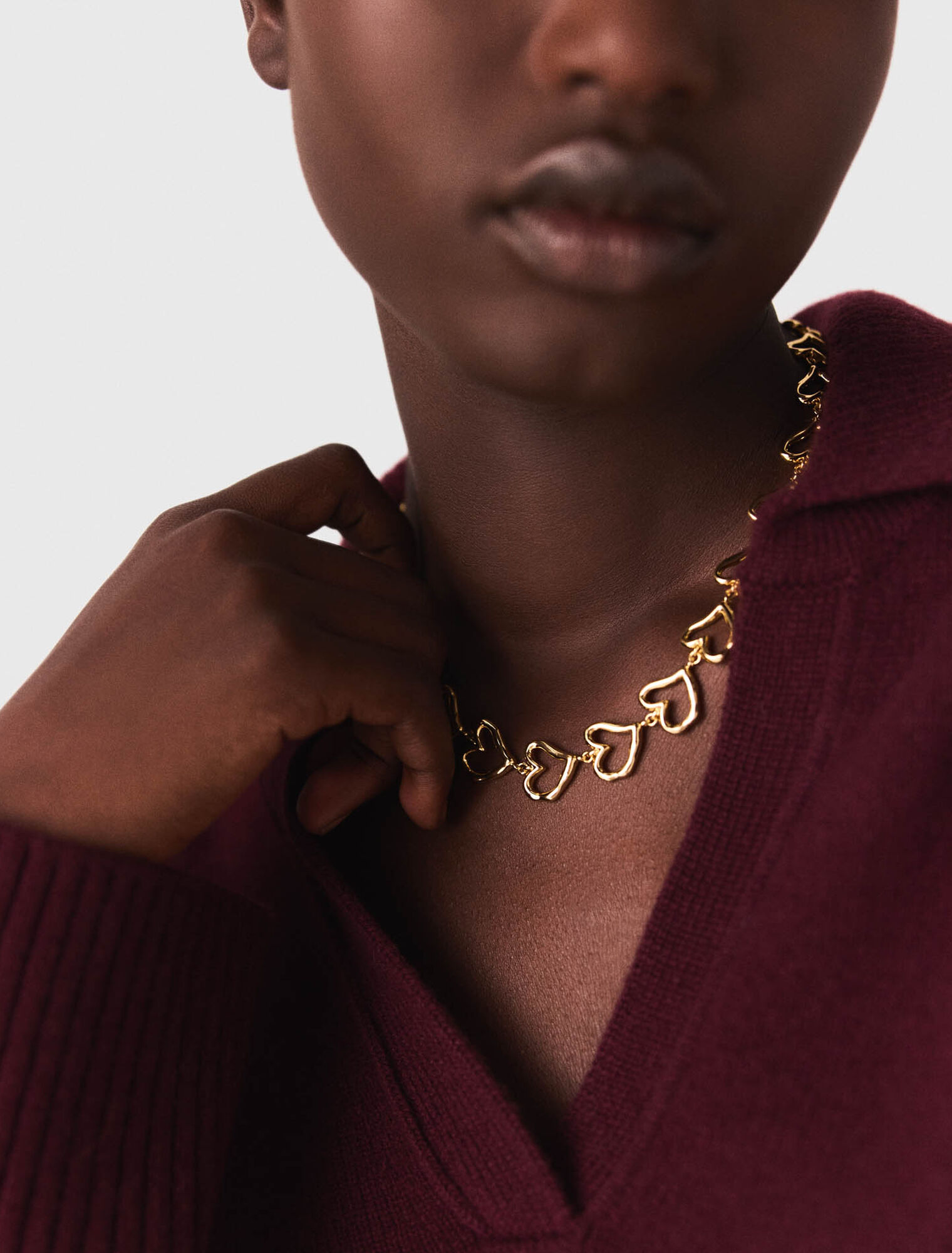 Collar corazón de latón dorado