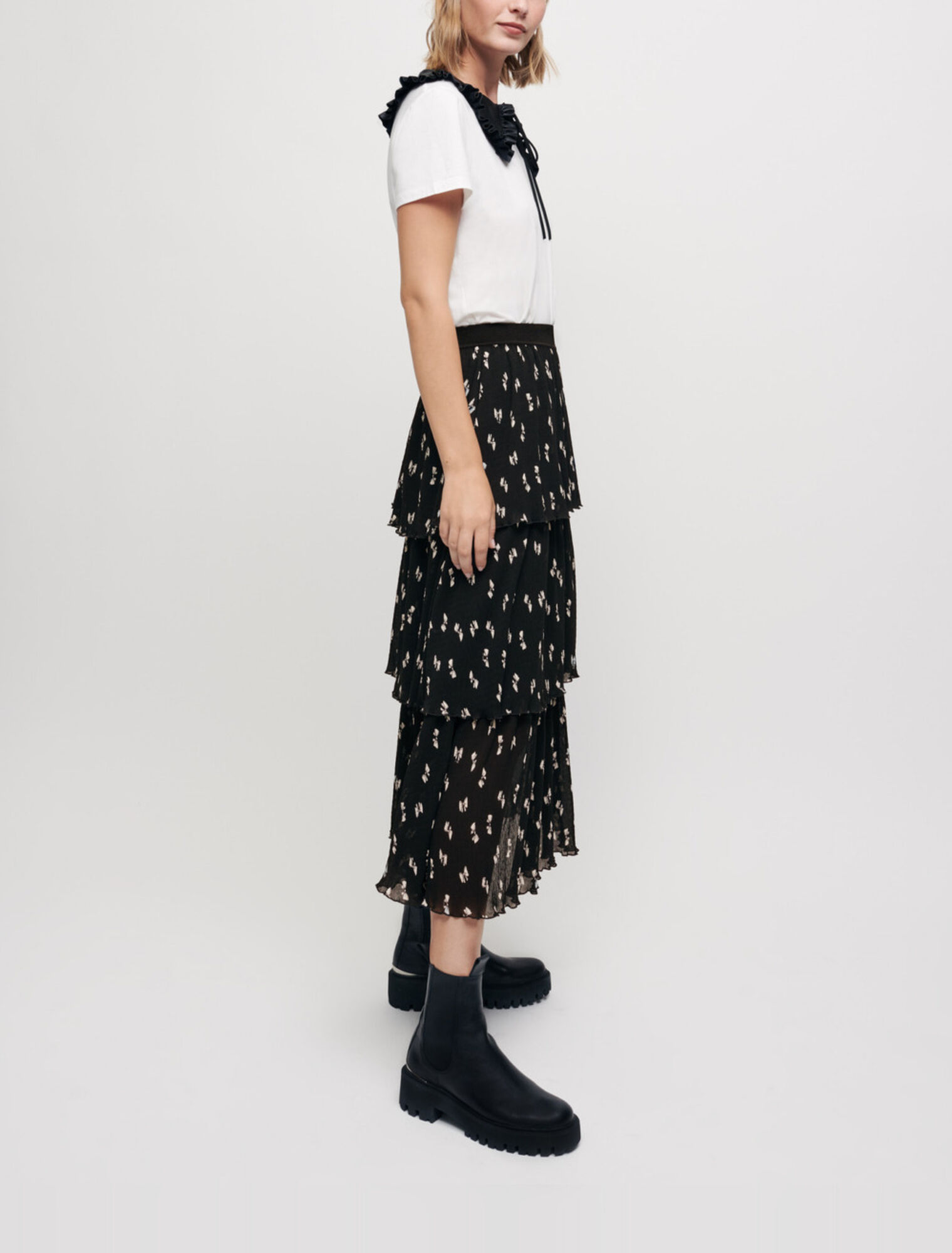 Minifalda plisada con estampado de lazos