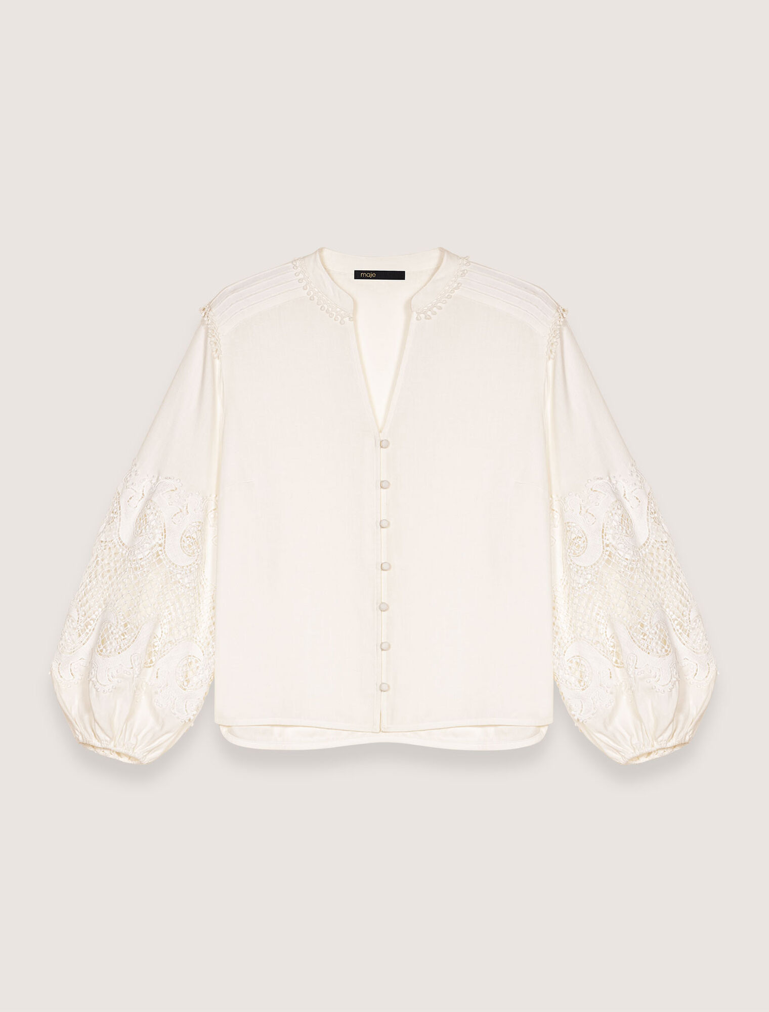 Camisa con mangas bordadas