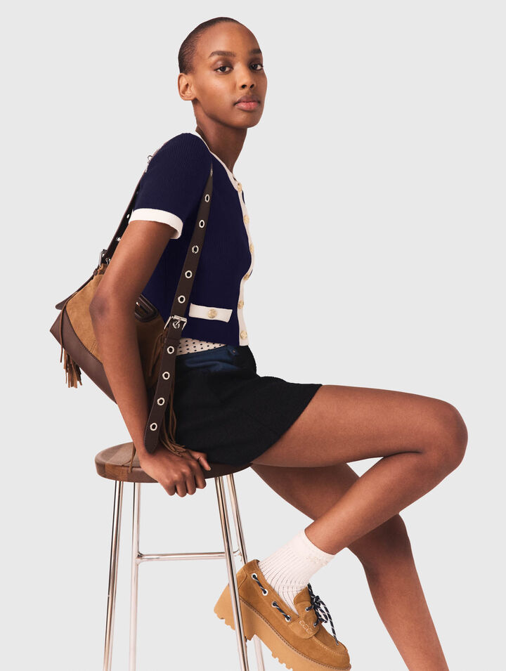 C&aacute;rdigan corto con detalles contrastados