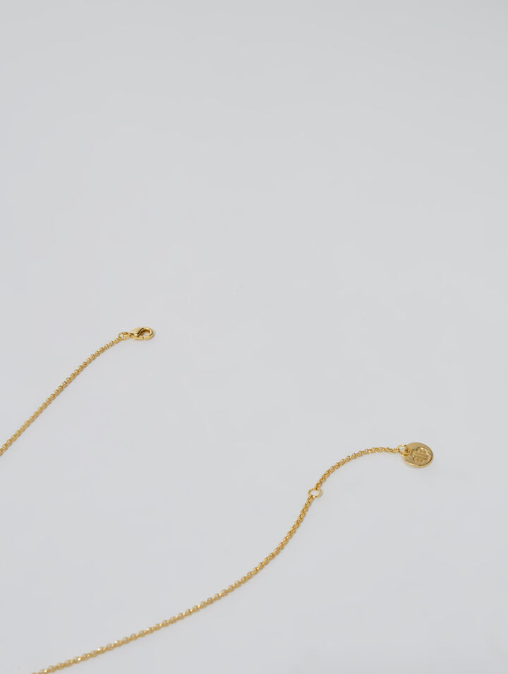 Collar dorado con brillantes