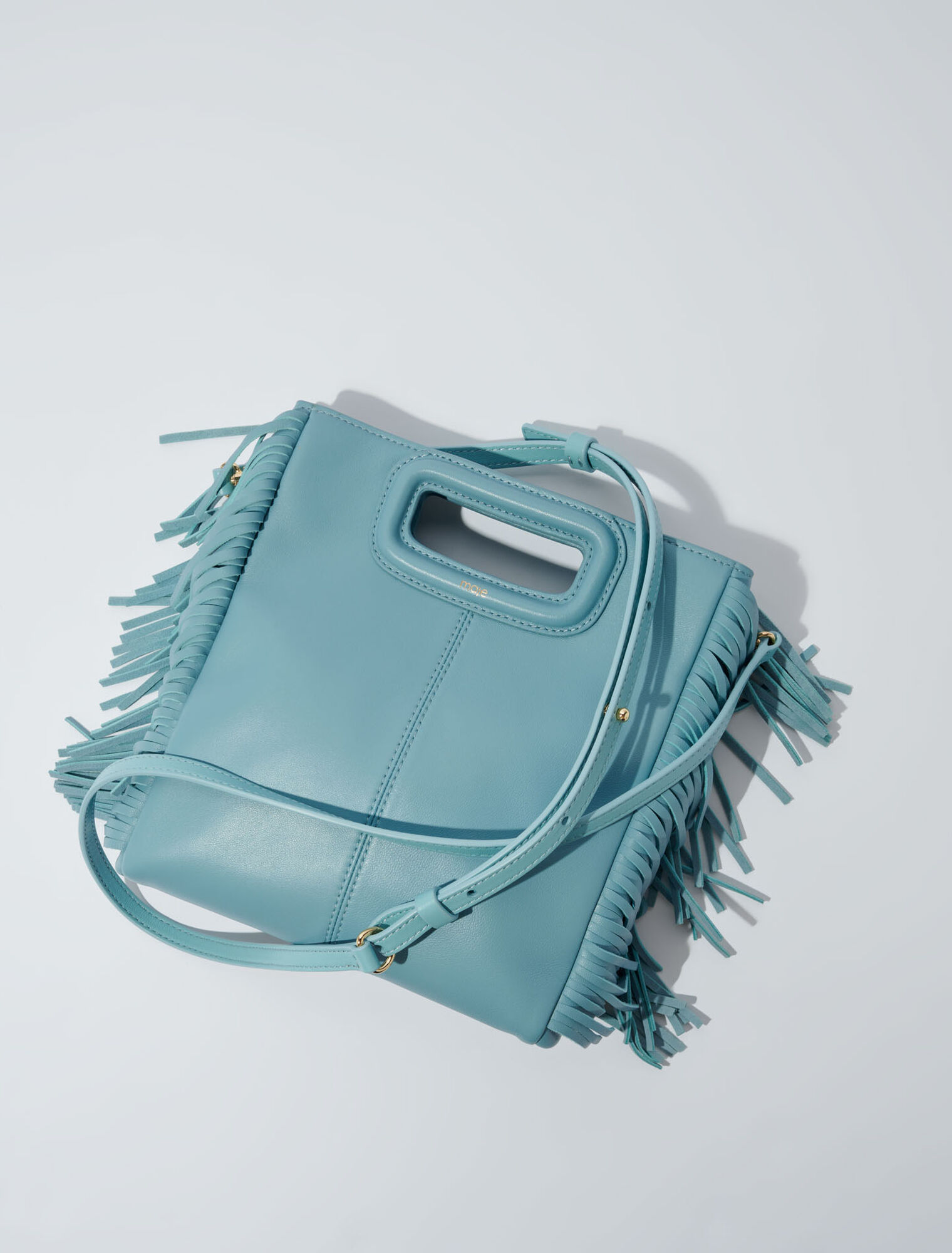 Bolso M con flecos de piel lisa