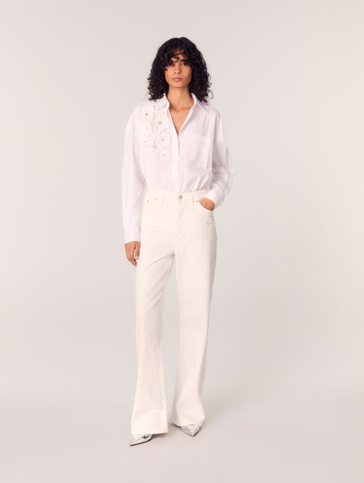 Camisa larga con flores bordadas