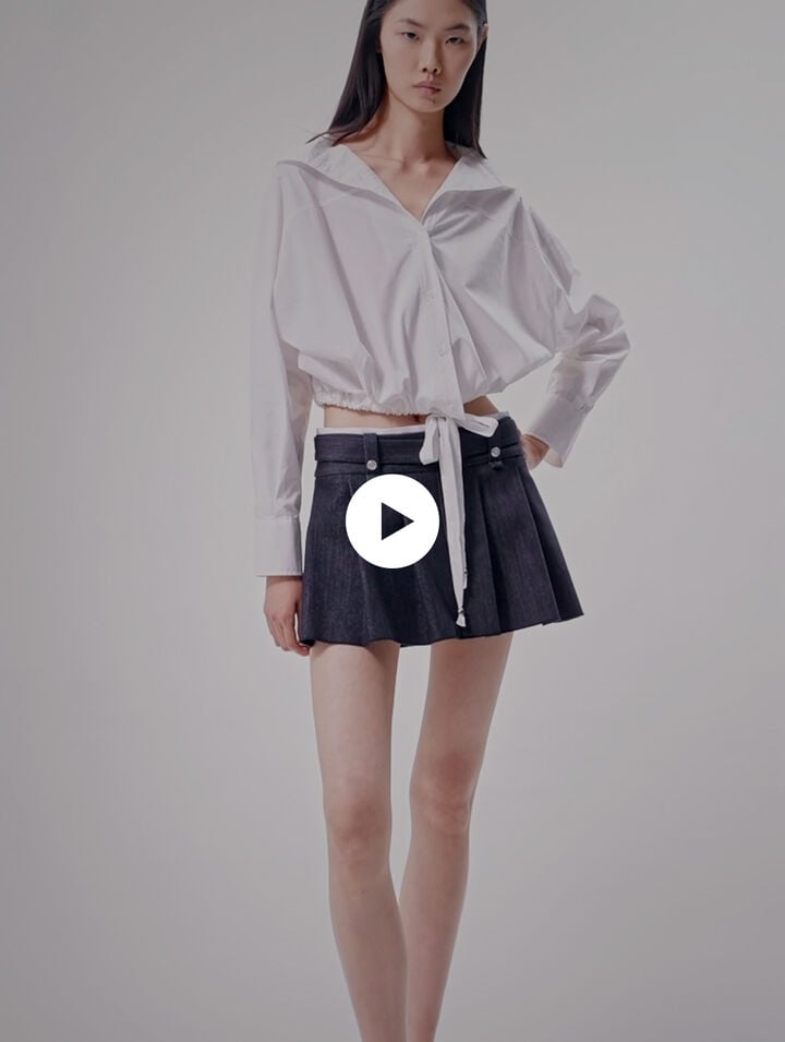 Minifalda negra efecto denim