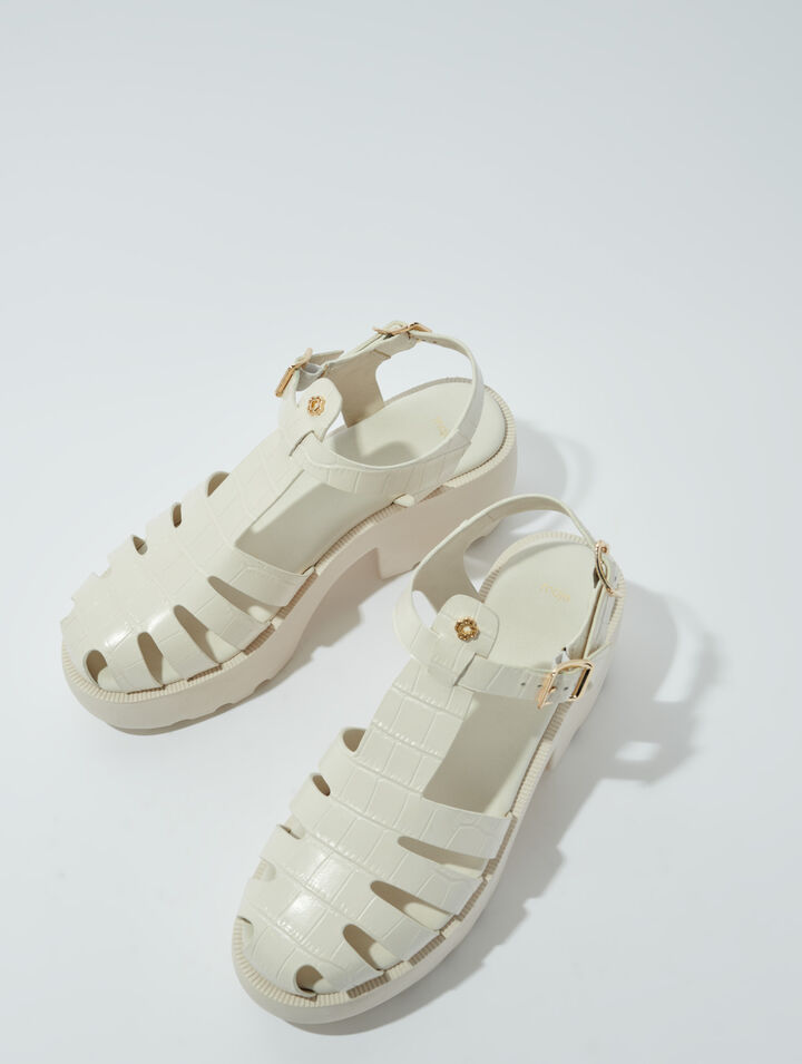 Sandalias de suela dentada en piel