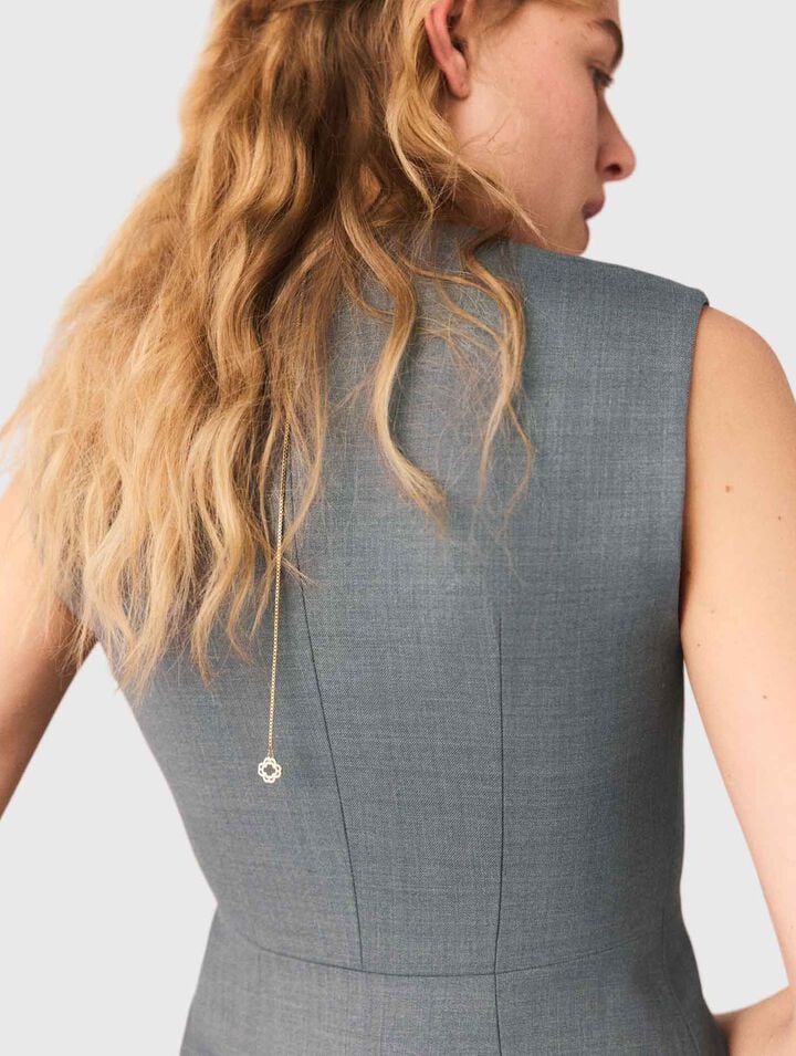 Chaleco de sastre con botones joya