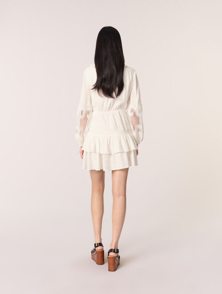 Vestido con volantes y mangas bordadas