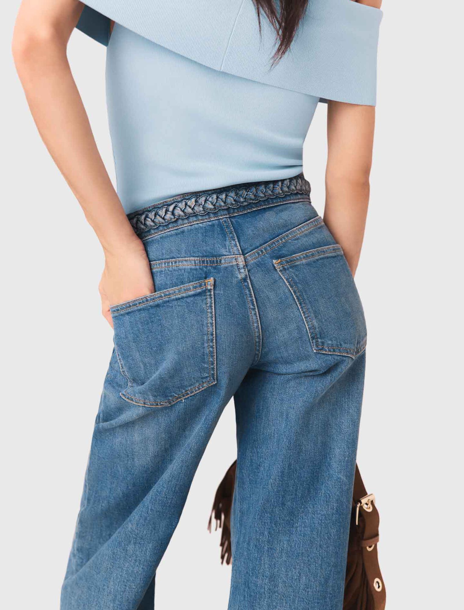 Vaquero acampanado con trenzas