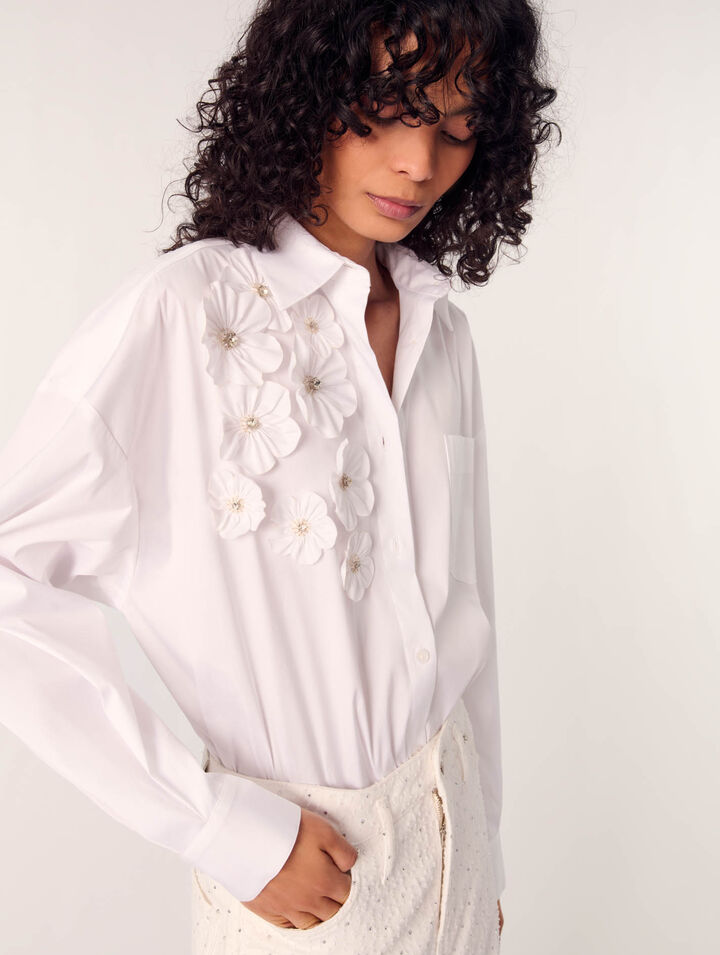 Camisa larga con flores bordadas