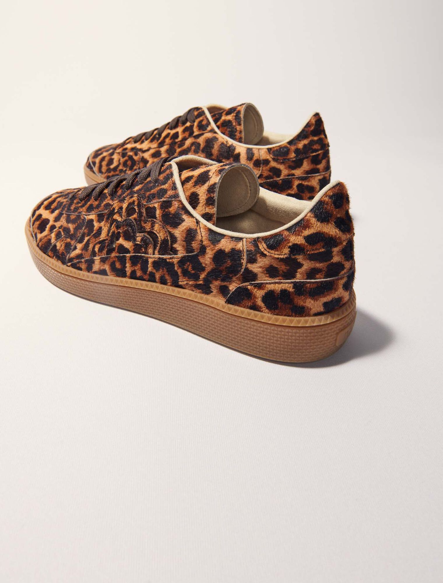 Zapatillas de piel con efecto leopardo