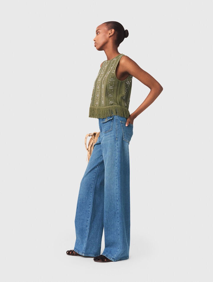 Top con flores de strass y flecos