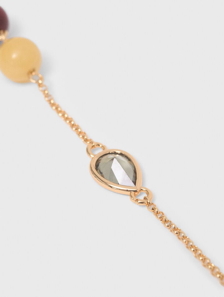 Pulsera con perlas y pedrer&iacute;a.